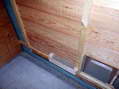 Outlet of the feeder hopper on the left, left hand nesting box on the right - Castel de Cantobre G&icirc;tes, Aveyron, France